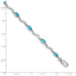 10k White Gold Fancy Diamond and Blue Topaz Bracelet - Image 4