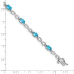 10k White Gold Blue Topaz and Diamond Infinity Bracelet - Image 4